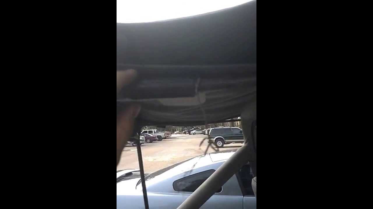 Putting down soft top on Jeep YJ