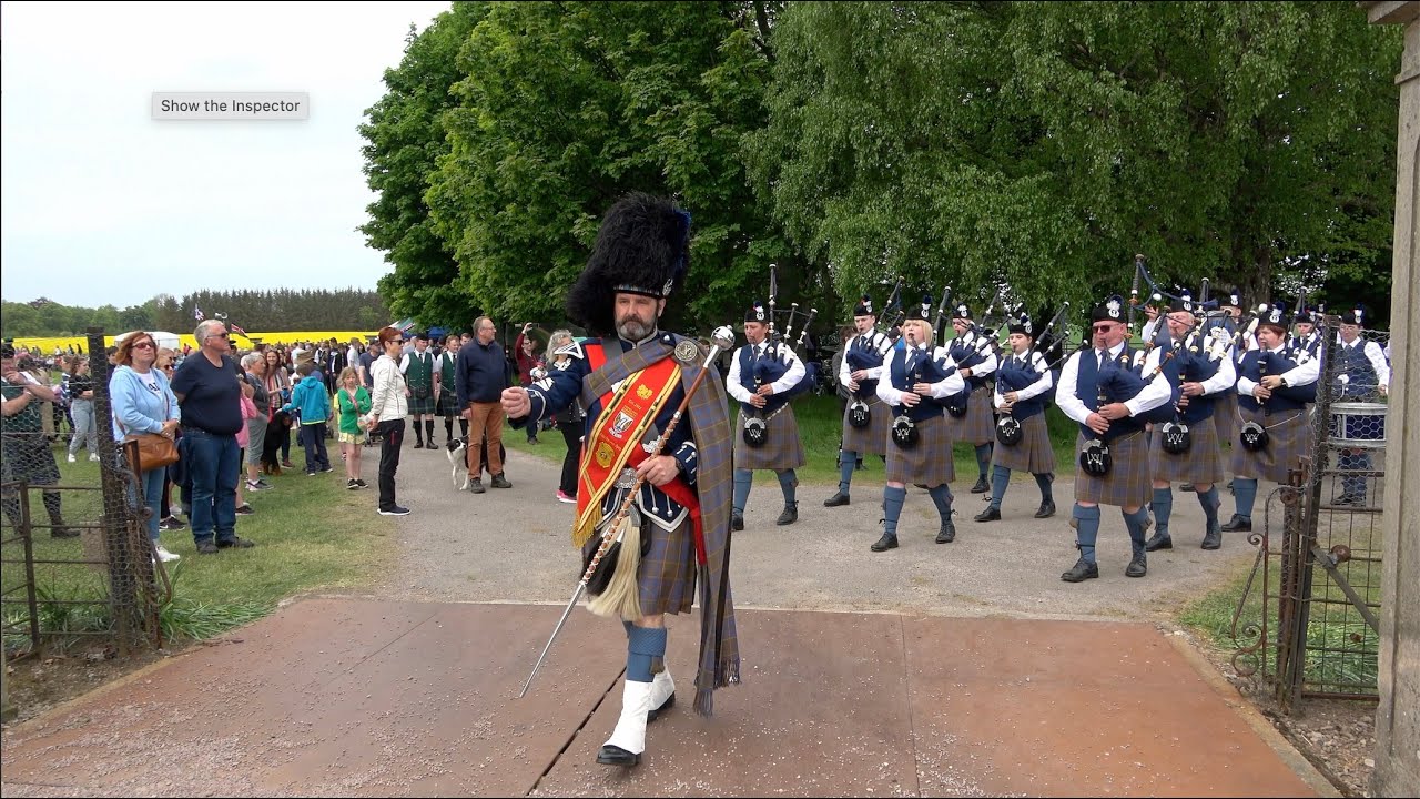 Scotland the Brave as Aberlour Pipe Band march in to play during 2022 Gordon Castle Highland Games
