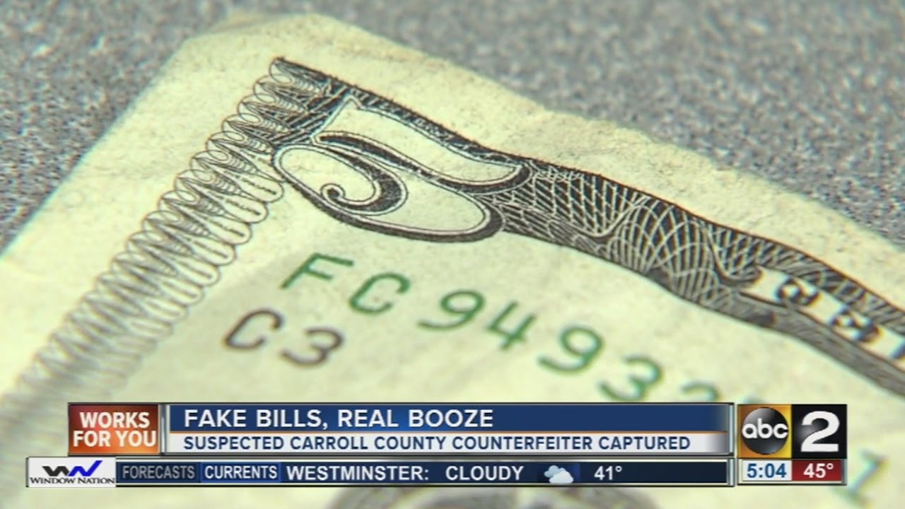 Man arrested for passing counterfeit $5 bills at liquor store