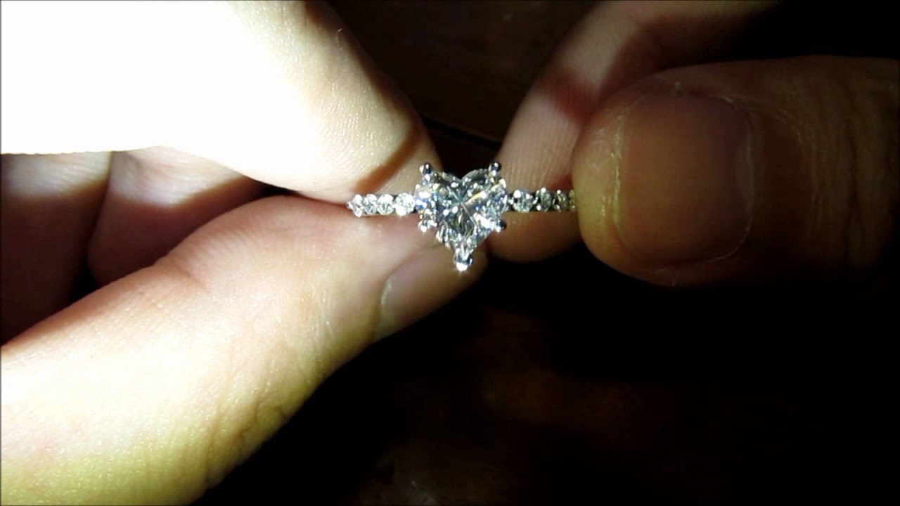 Heart Shaped Diamond Ring Under Different Lightings