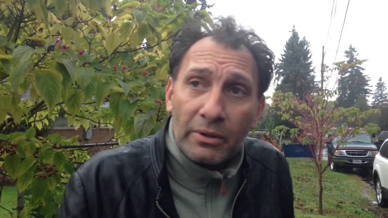 Jerry Stevens, relative of deceased couple, speaks