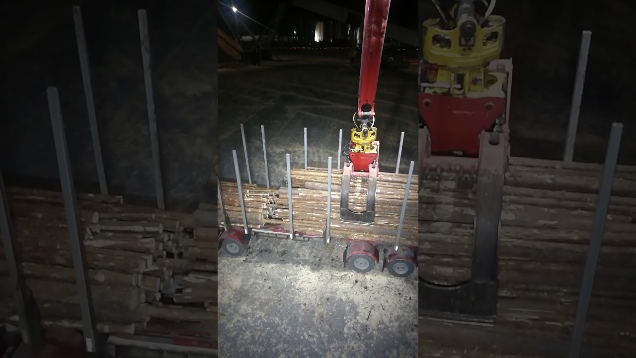 Timber truck unloading. Puutavarayhdistelmän purku.