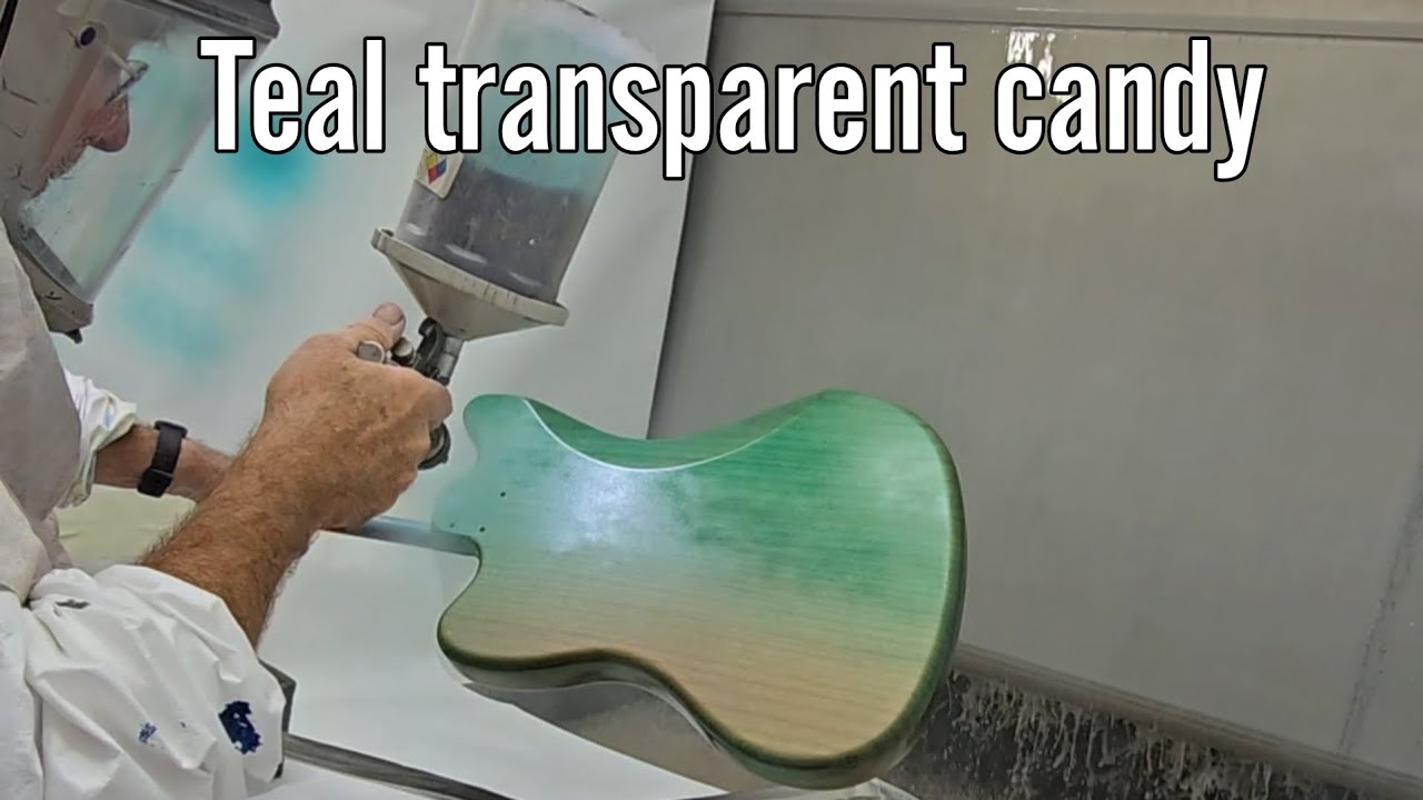 Spraying a Jazzmaster in transparent Teal candy.