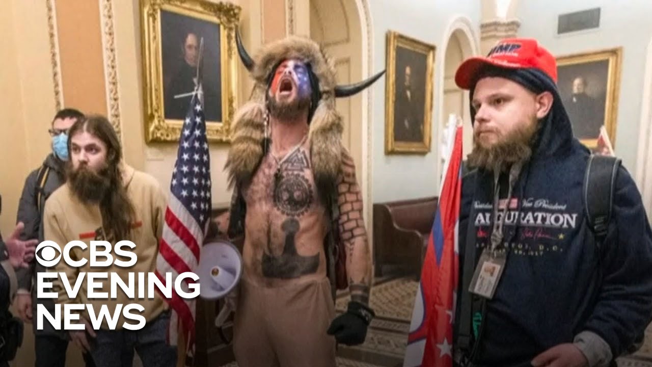 Conspiracy theorists and lawmaker among mob that seized Capitol