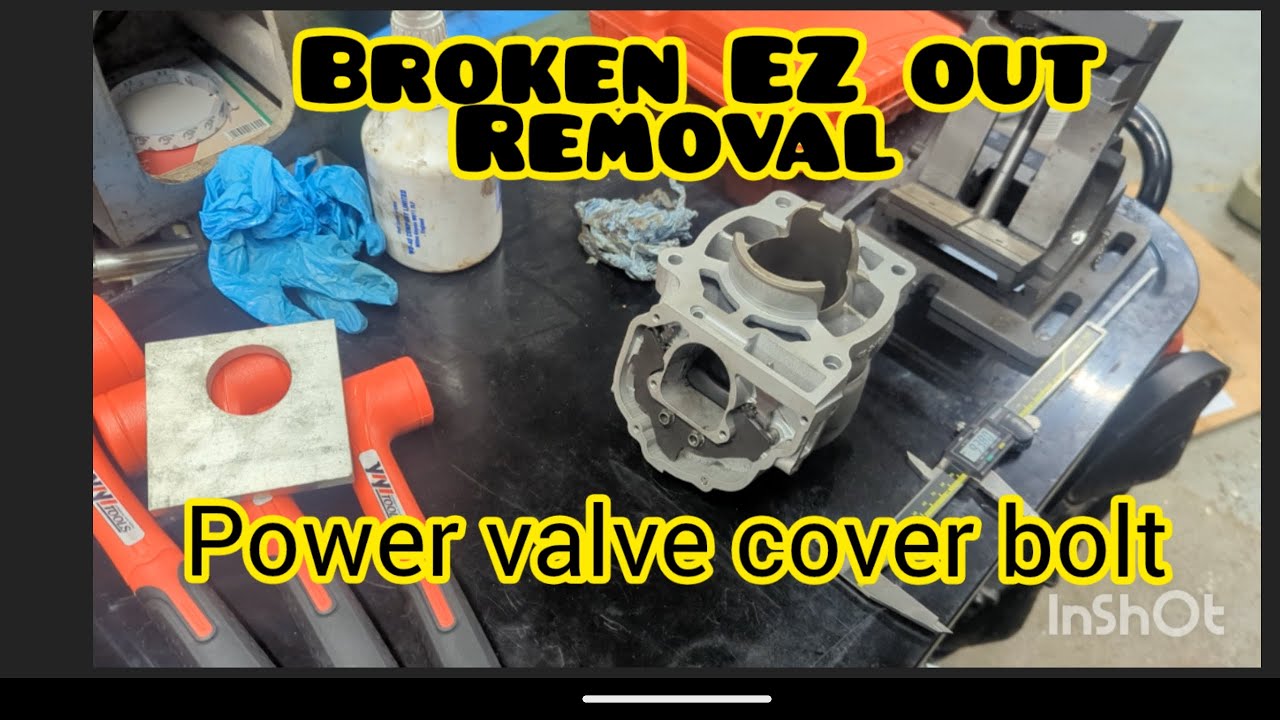 removing a broken EZ out & bolt from 2 stroke power valve cover