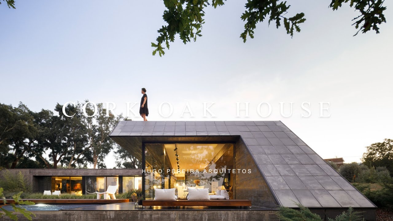Angular Concrete House Design On A Hilltop Around Existing Cork Oak Trees