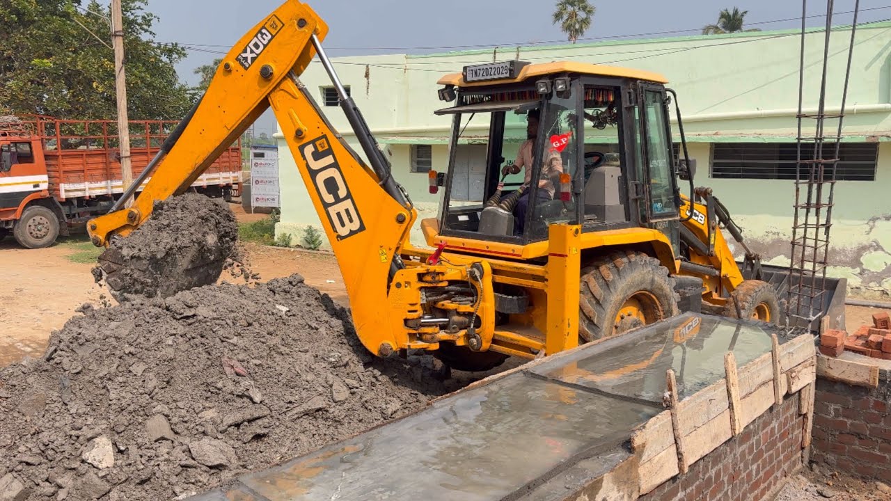 JCB 3dx plus backhoe loader filling soil to concrete pillar and digging hole for coconut tree ￼