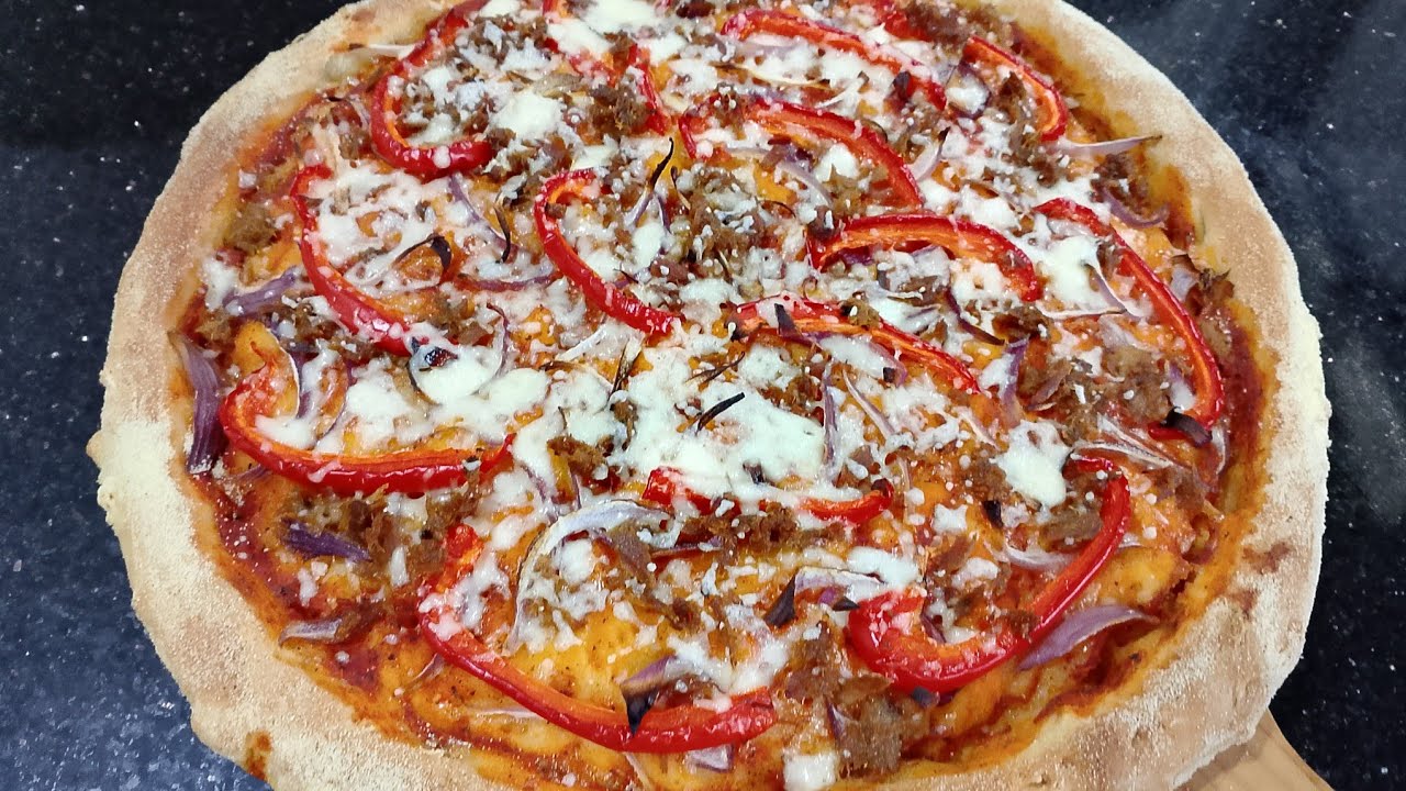 بيتزا 🍕 بدون ذلك ولا مجهود بحشوة الطون حضري بيتزا خطيرة ضروري تجربوها 👌🤤😋