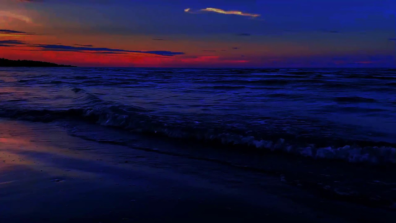Continuous Ocean Waves on a Peaceful Empty Beach