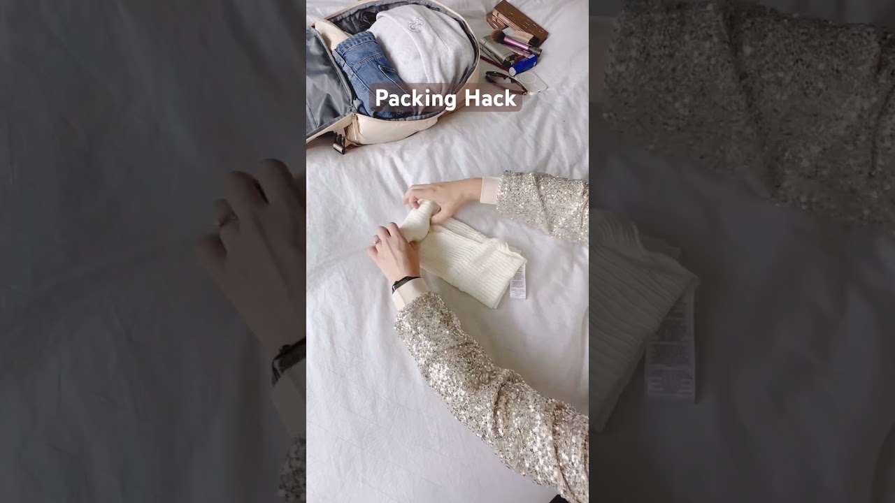 Packing hack how to roll a t-shirt #hack #travel