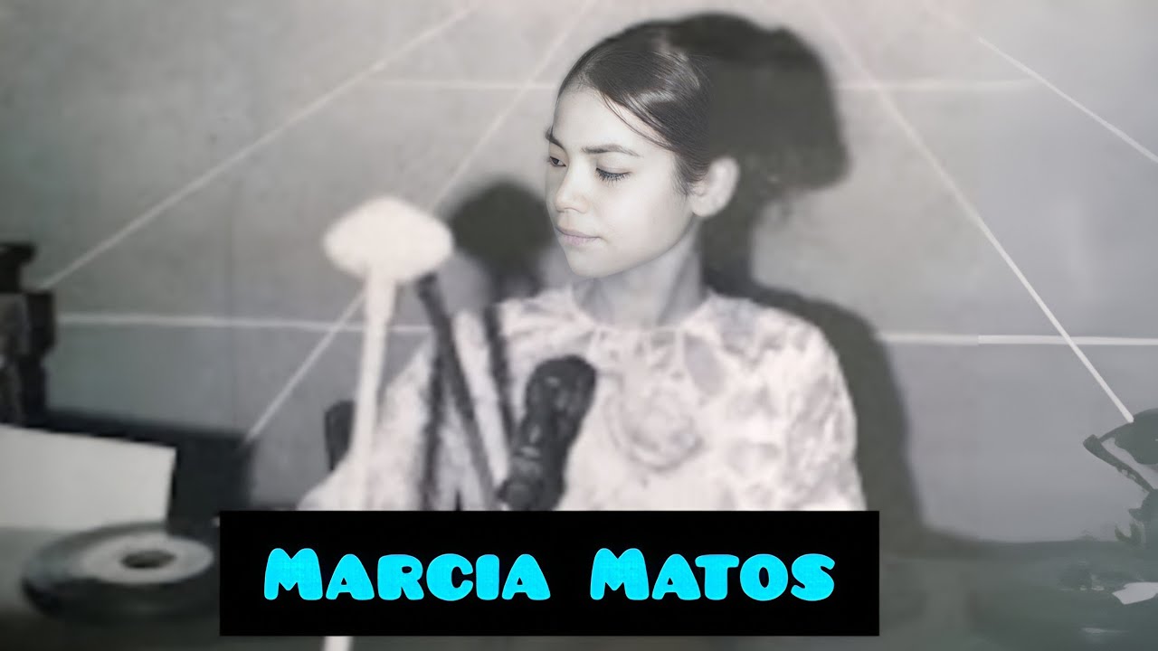 VISITANDO LA TUMBA DE MARCIA MATOS la locutora de radio guarachita,icono de la locución  en DOMINIC.