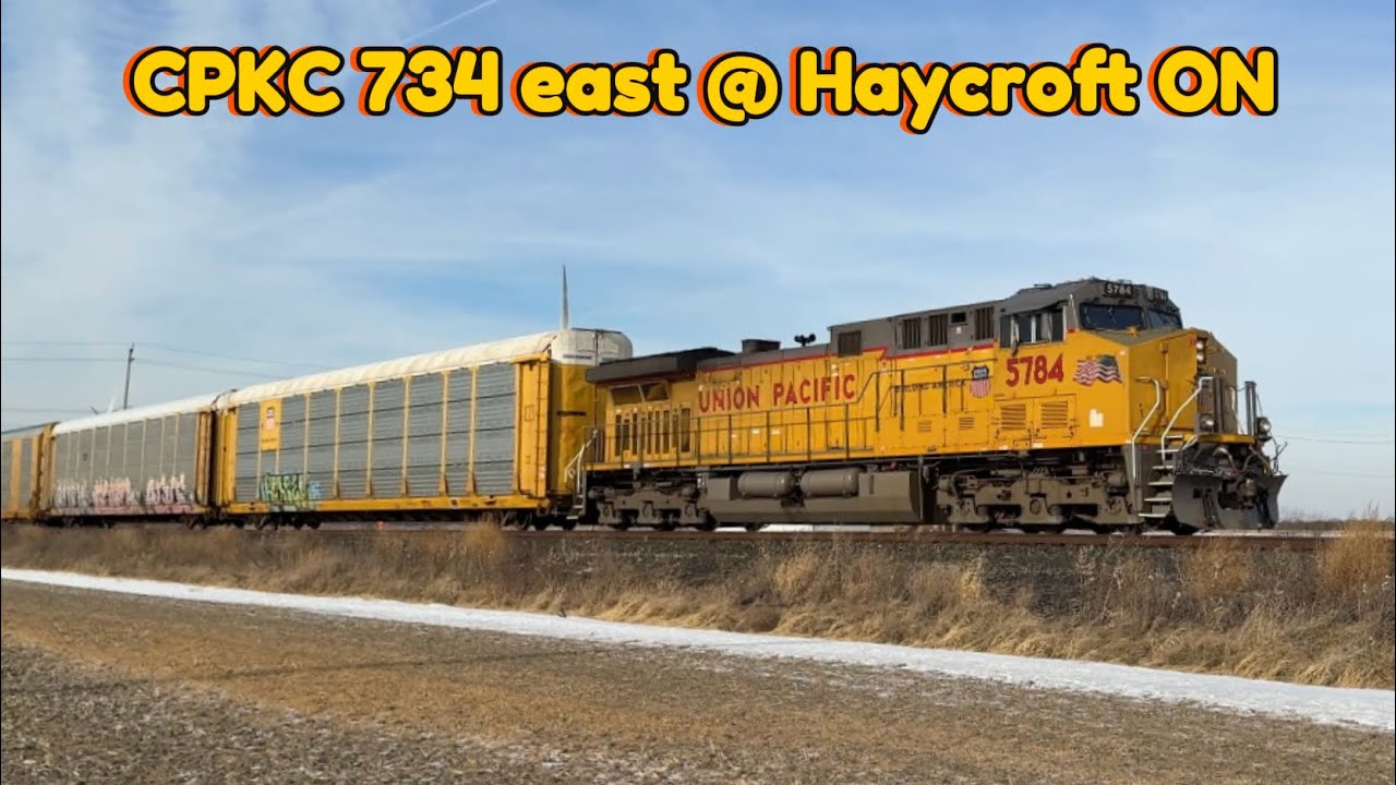 CPKC 734 east @ Haycroft ON with a UP leader. 12-16-2025