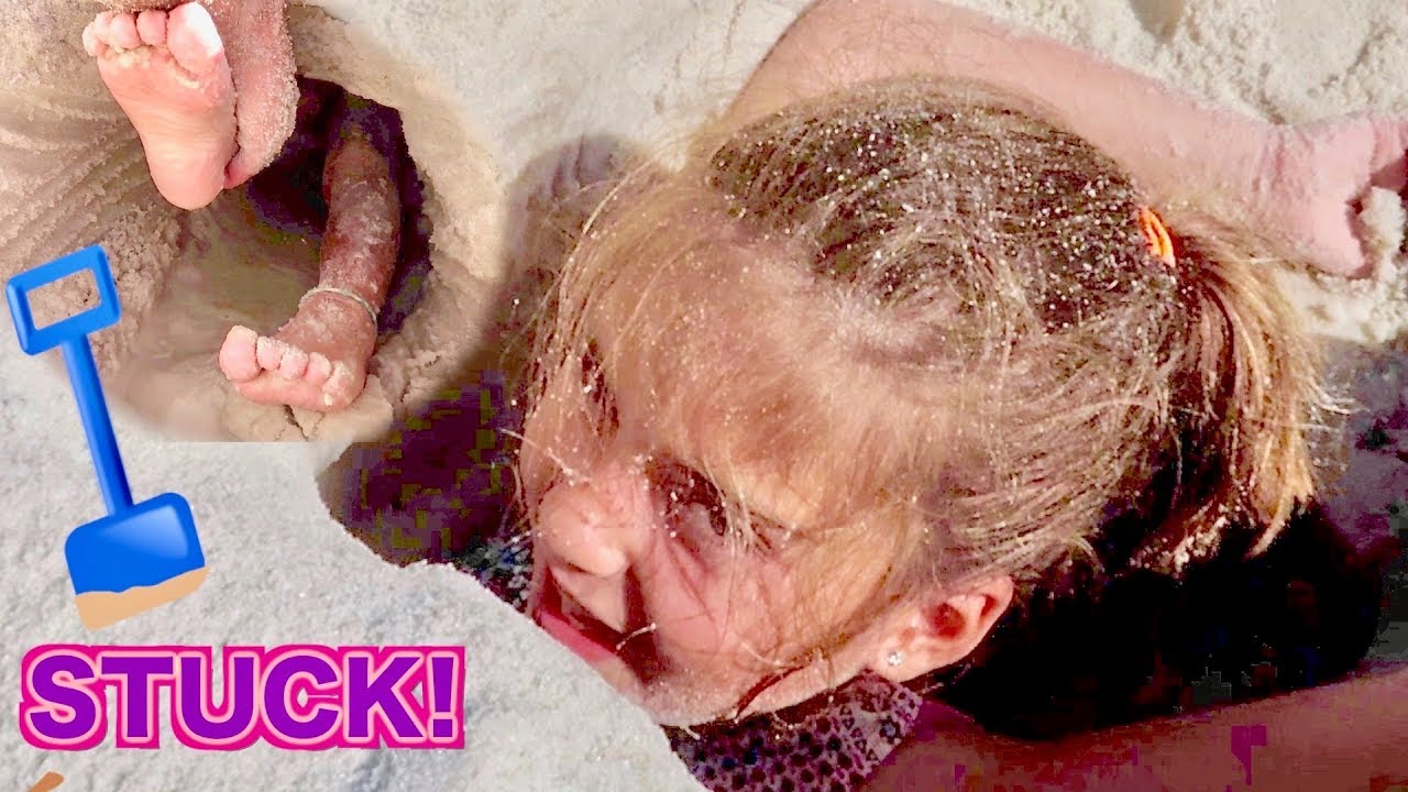 KID STUCK IN A BEACH SAND TUNNEL!
