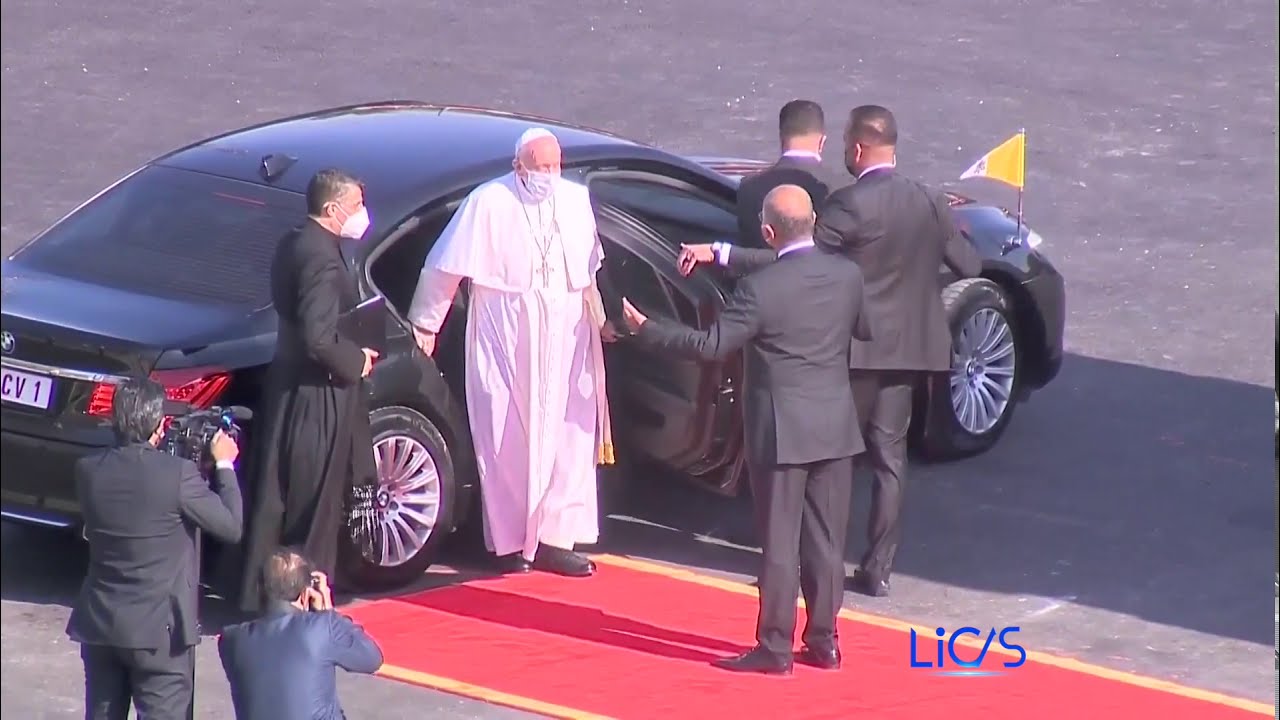 Pope Francis welcomed by Iraqi President Barham Salih at the Presidential Palace in Baghdad