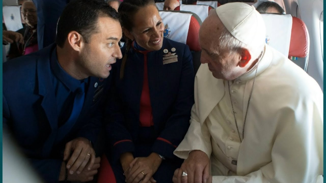 Pope Francis marries couple in the skies during a flight | ITV News
