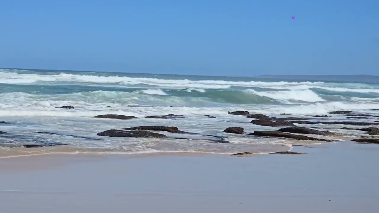 Driving to the beach in Dana Bay, Mossel Bay, Garden Route, Western Cape, South Africa 