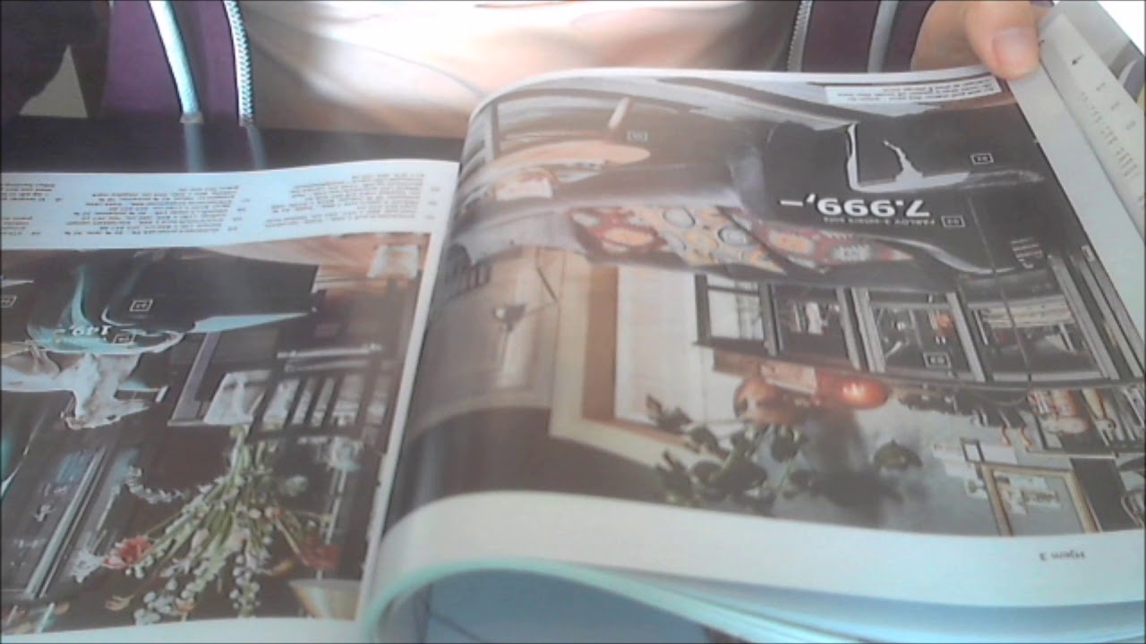ASMR: Looking through the new IKEA catalog (chewing gum/whisper)