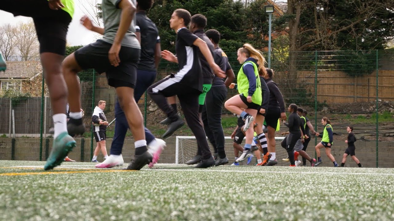 How is Harlequins helping to develop better students at Harris Academy in Crystal Palace?
