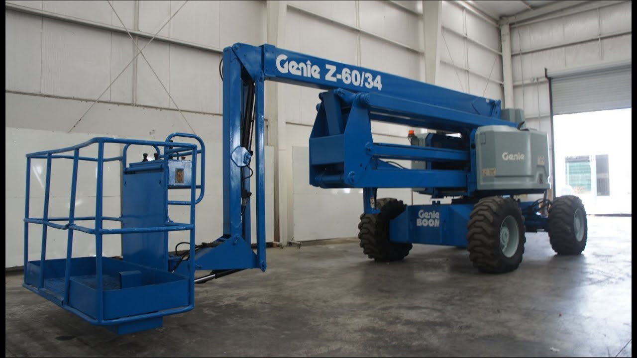 Como Operar o Manejar una Plataforma Articulada Marca GENIE Modelo Z60/34/4WD Diesel de 500 Libras