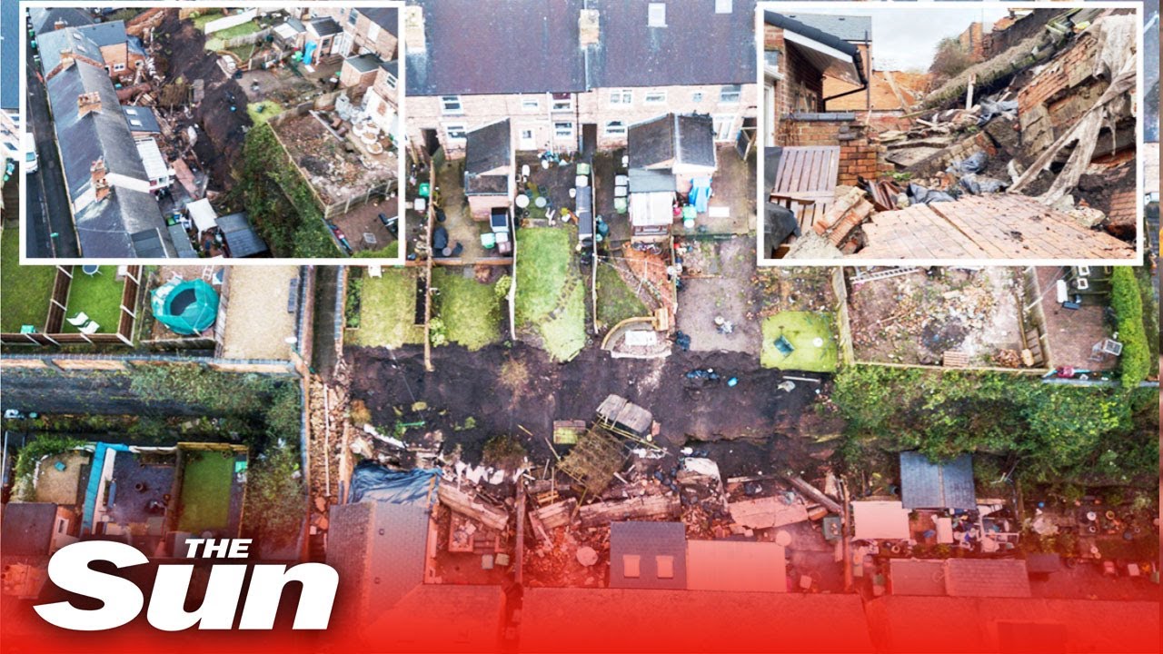 Families evacuated after landslide causes 70ft wall to collapse onto homes