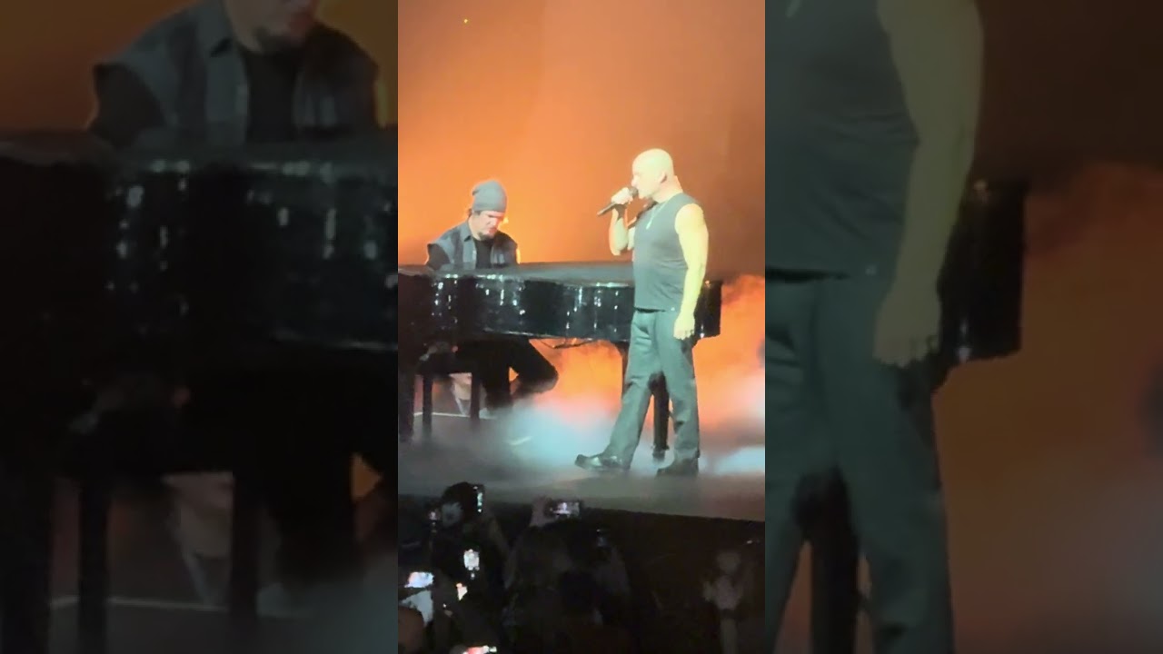 Disturbed performing "Sound  of Silence" live in concert