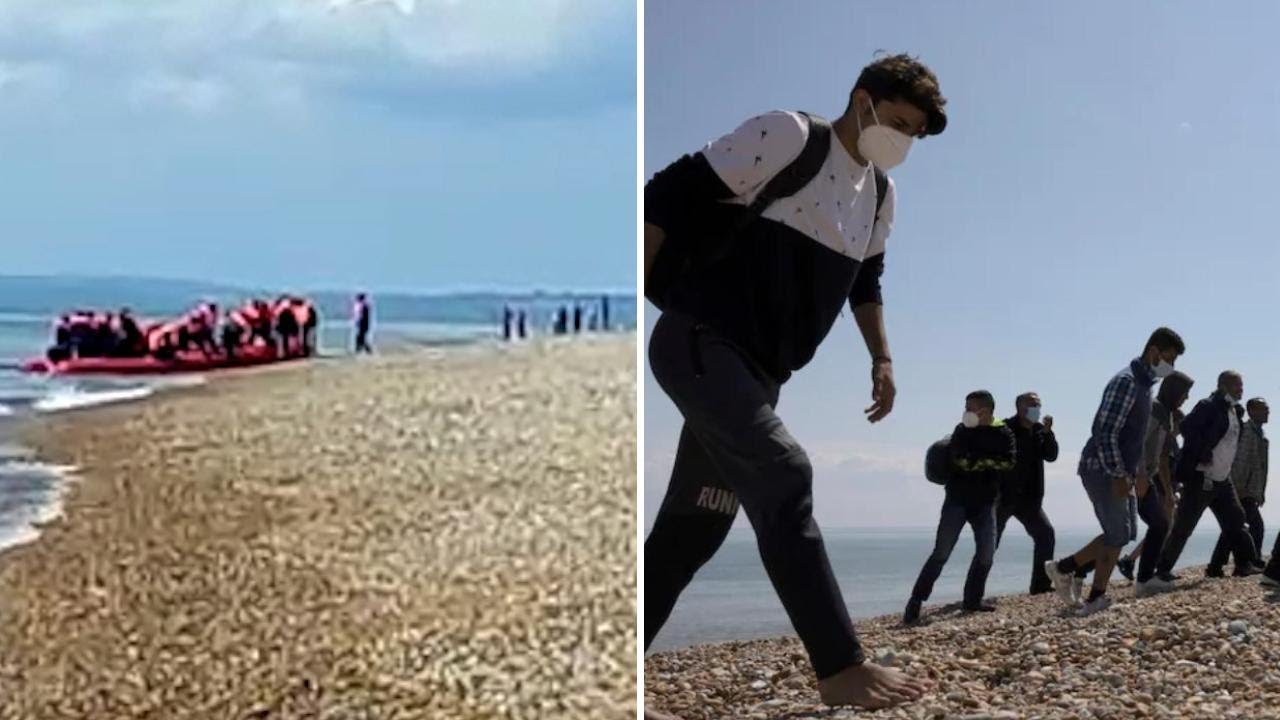 Migrants in overloaded dinghy reach Kent shoreline on record day of crossings