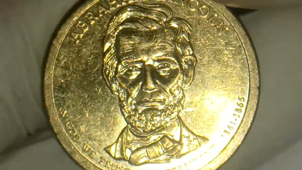 2010 P ABRAHAM LINCOLN US DOLLAR COIN WITH EDGE MINT LETTERING ERROR ON RIM