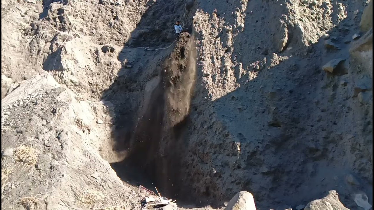 Extreme Manual Labor: Collapsing Black Sand Cliffs from the Top