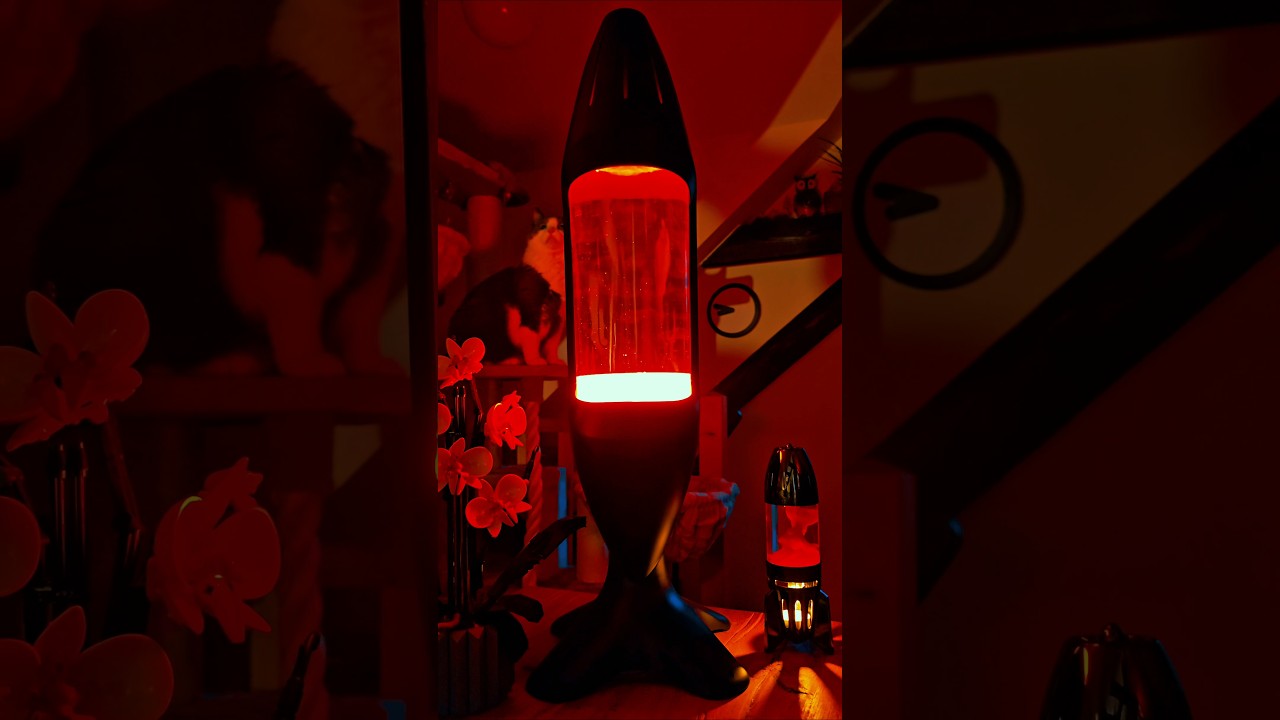 Mathmos IO giant lava lamp versus small Fireflow candle lamp