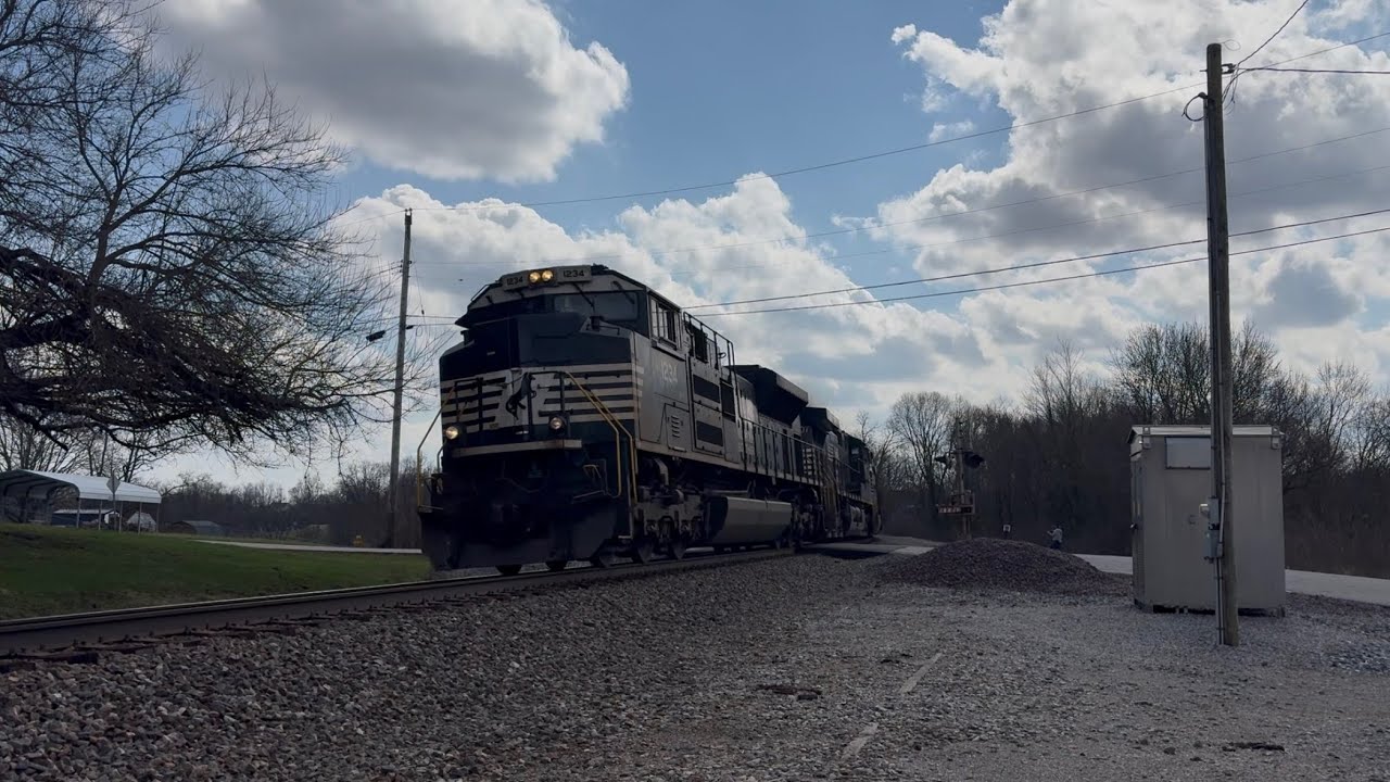 Watch a Train Slowly Conquer a Grade and a Foreign Power NS Train