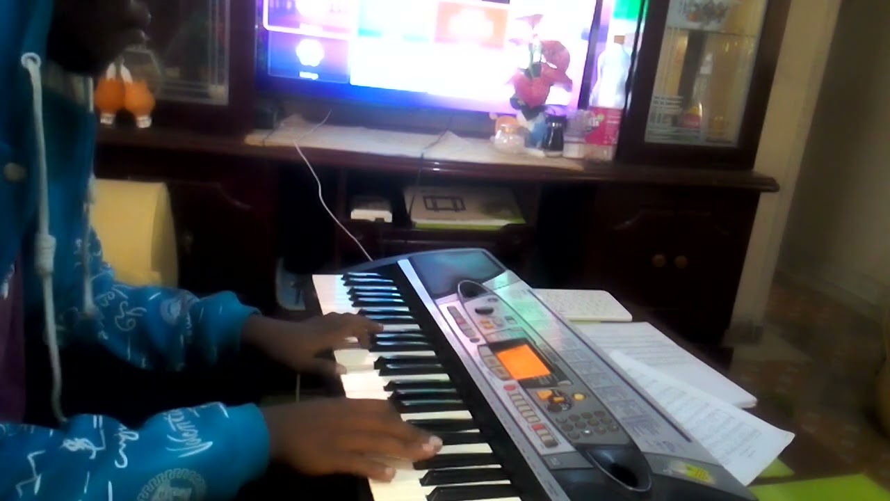 KARIBU MOYONI MWANGU LEO YESU WANGU MPENZI BY HOLY TRINITY CUEA PLAYED BY ADRIAN
