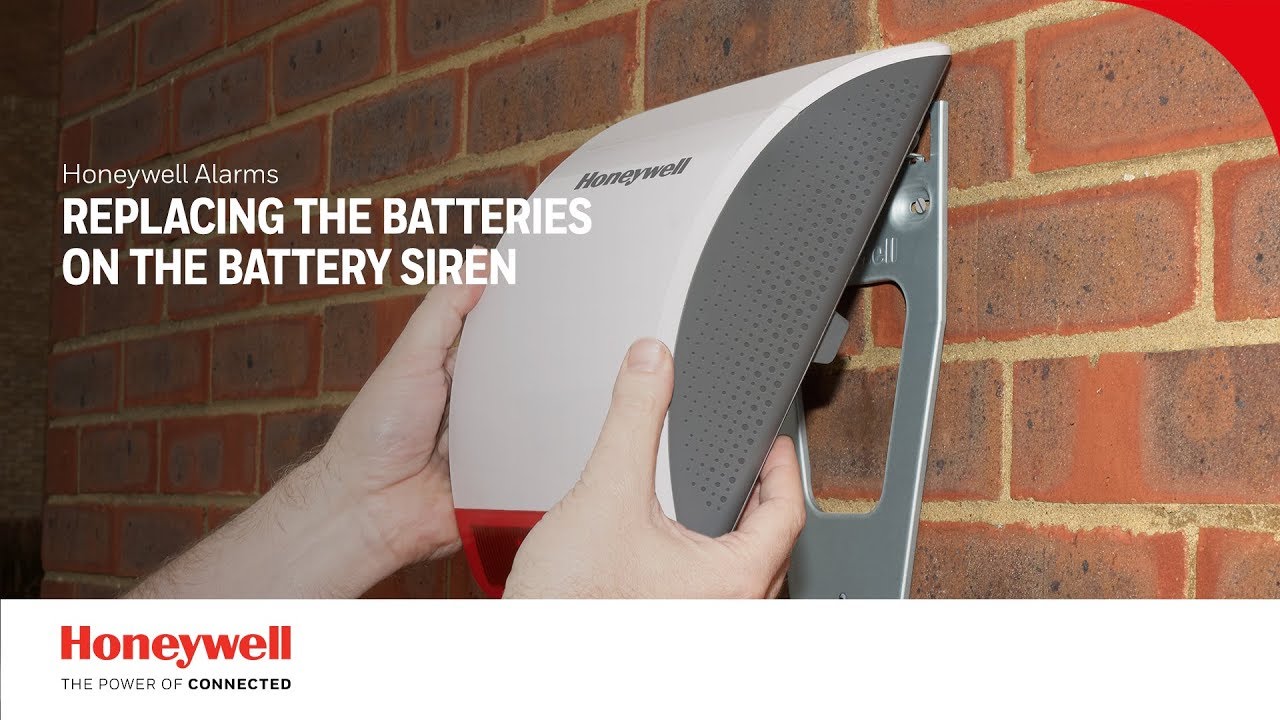 Replacing the batteries on the battery siren | Alarms | Honeywell Home