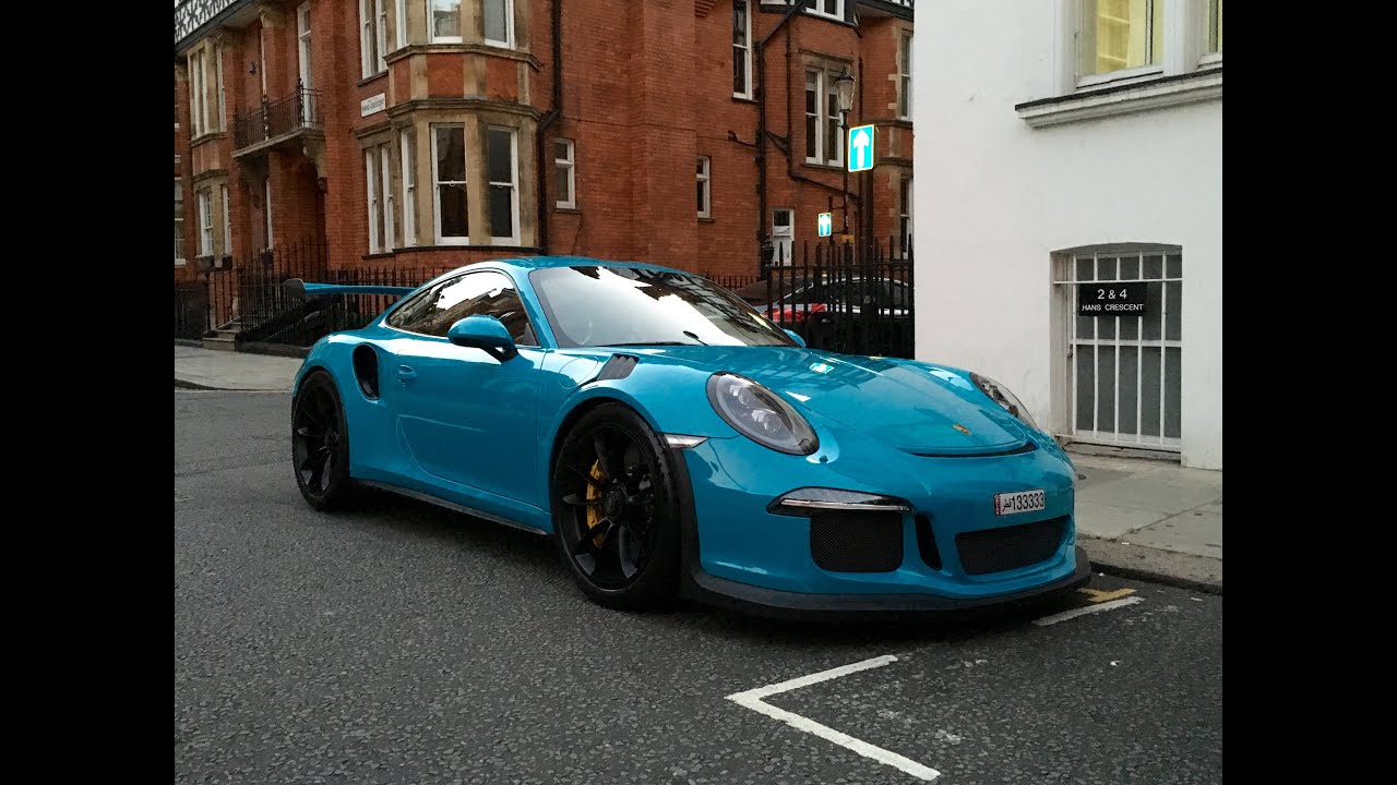 Miami blue Porsche 911 GT3RS startup and driving around.