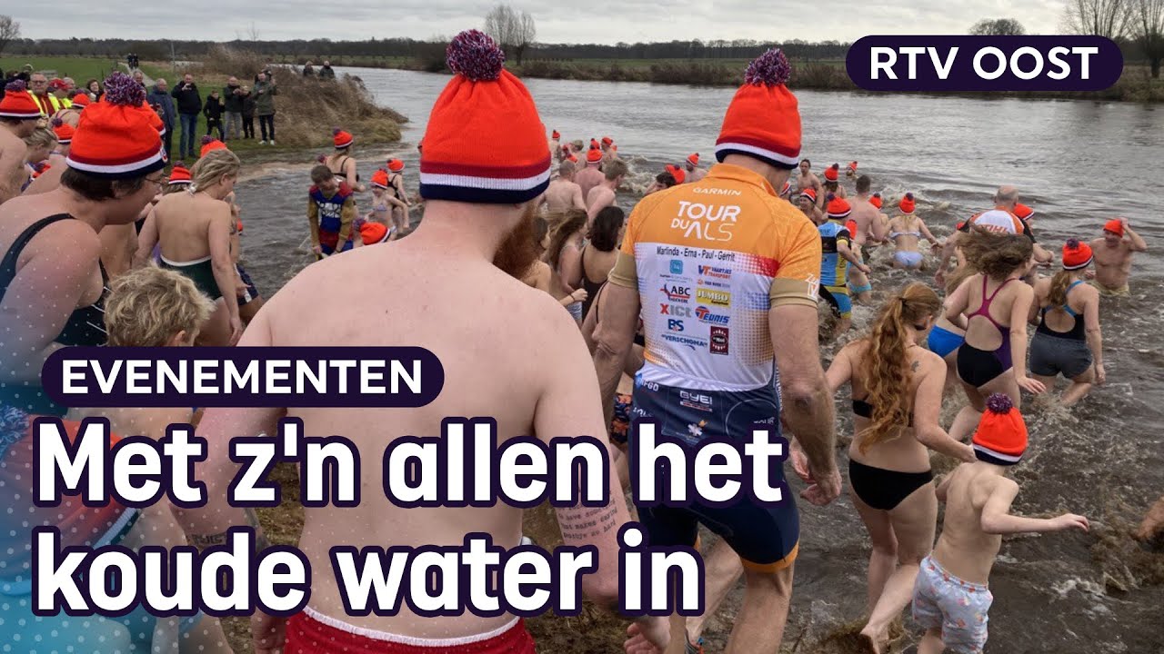 Nieuwjaarsduik 2023: kijk hier hoe mensen het koude water ingaan in Dalfsen | RTV Oost