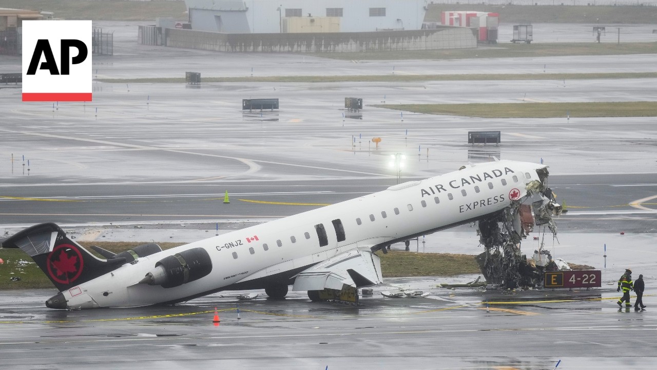 Scene at LaGuardia Airport after pilot and copilot killed in collision