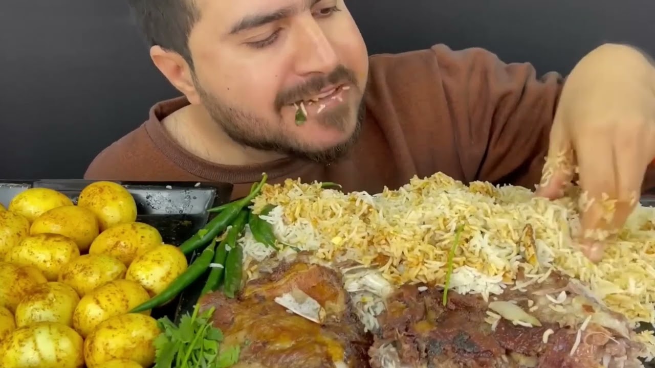 Eating mutton roast with masala egg, rice