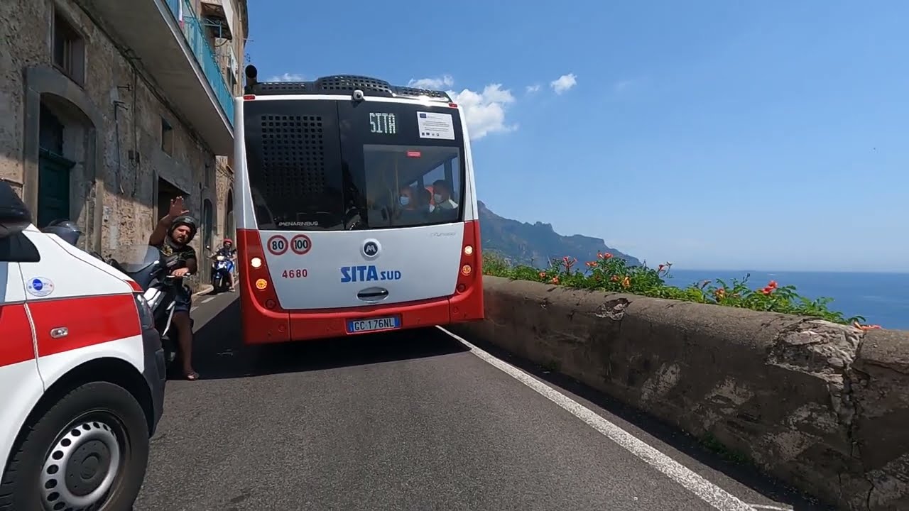 Amalfi Coast drive - dangerous situation, road blocked by truck, bus and ambulance.
