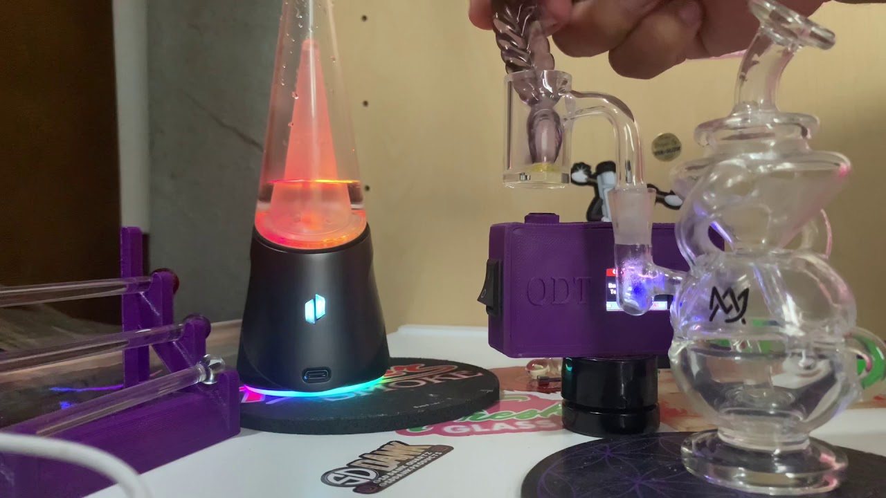 Puffco Peak Pro x Mj Arsenal Infinity rig with bear Quartz banger