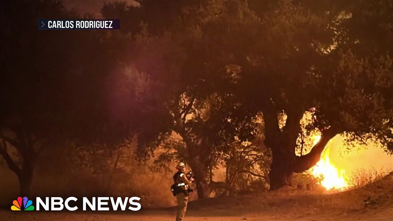 New wildfire prompts evacuations in Los Angeles as dozens rage out west