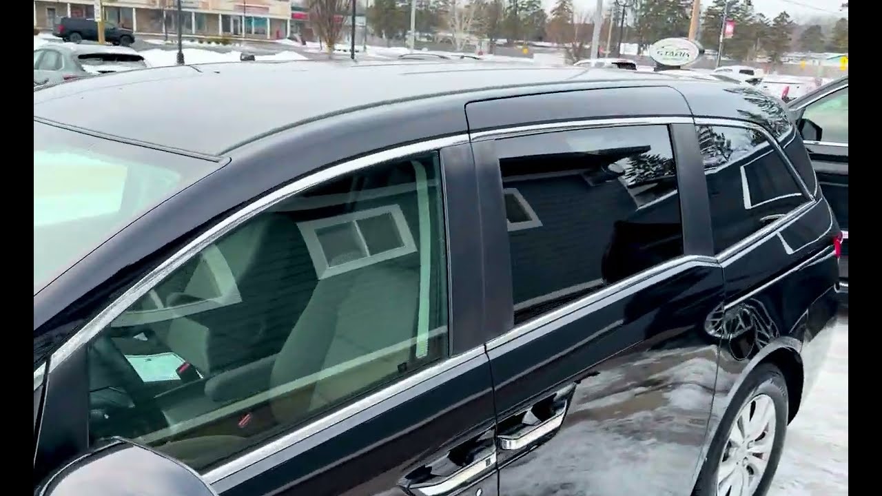 2016 Honda Odyssey SE w/Rear Entertainment System 74,298 miles Stock# J5075 Vin: 5FNRL5H32GB165621