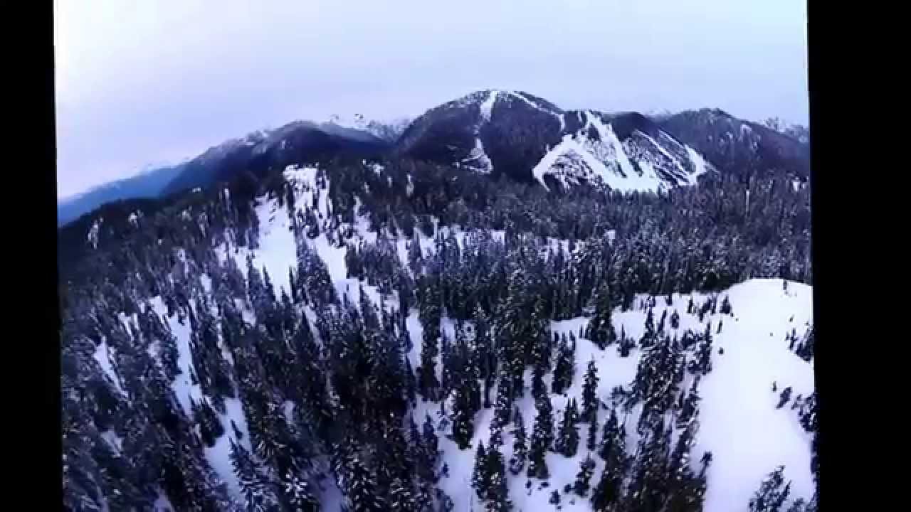 360 degree drone flight capture from above Mt Strachan / Cypress with view of Bowen Island