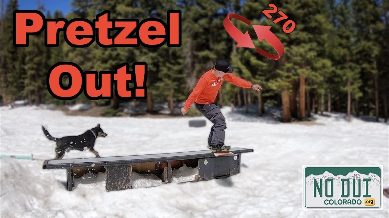 Snowboarding Backside Boardslide Pretzel Out!
