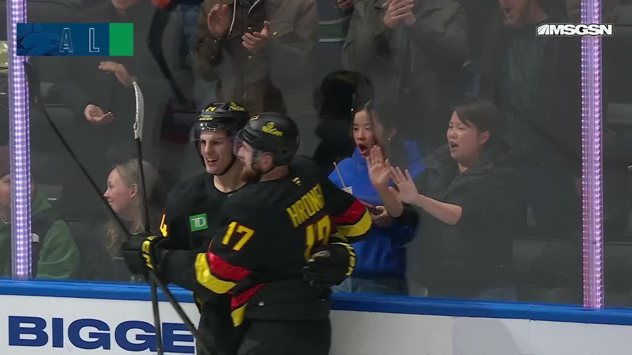 Zeev Buium scores a goal against the New Jersey Devils