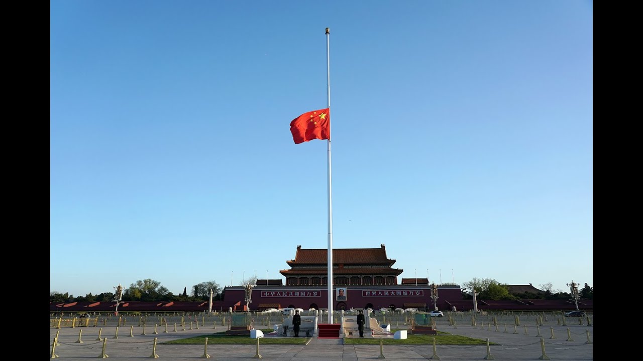 China's national flag flies at half-mast on April 4 to mourn people who died in coronavirus outbreak