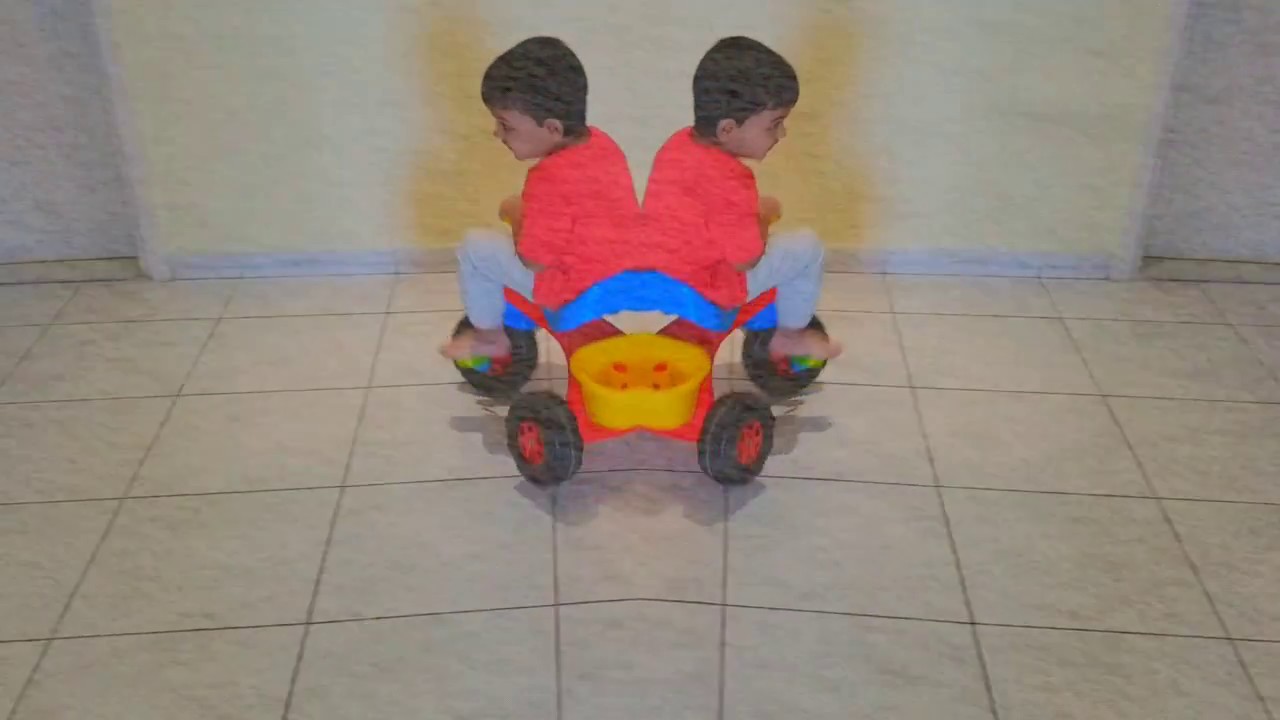 Baby riding tricycle. Ryan's video from Kids' Toys and slides