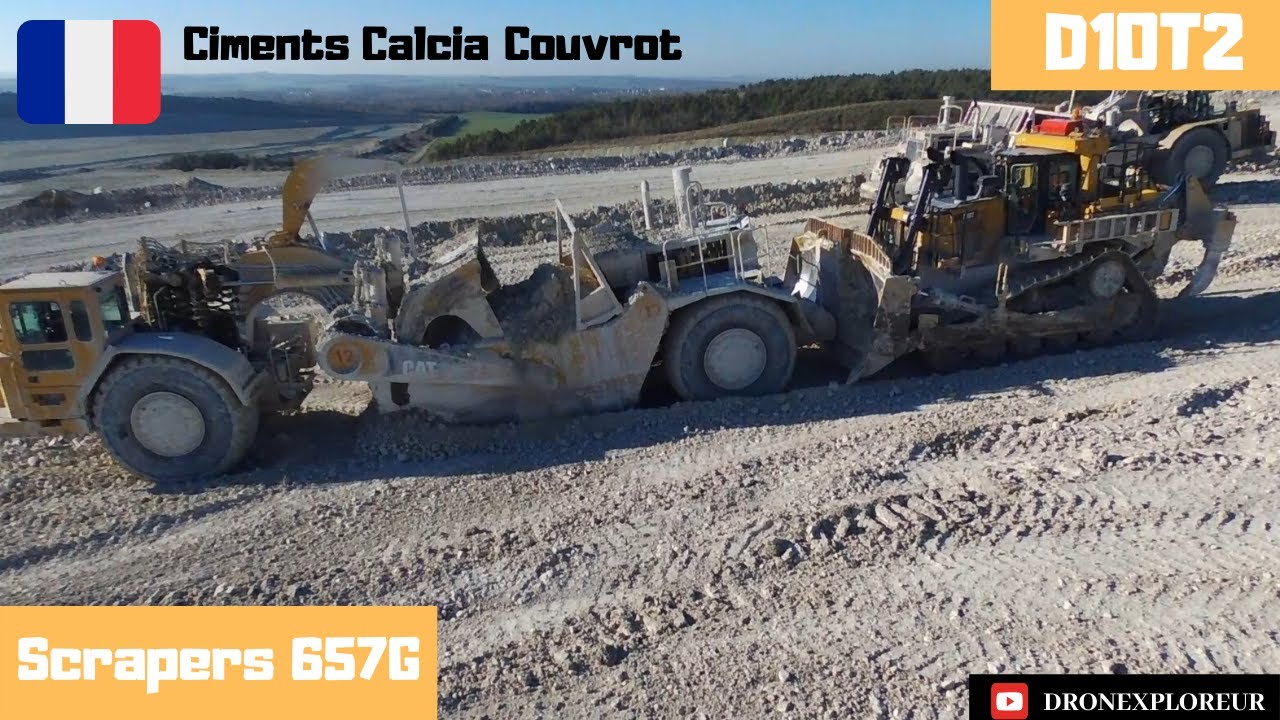 CAT Biggest scraper 657G in action and D1OT2