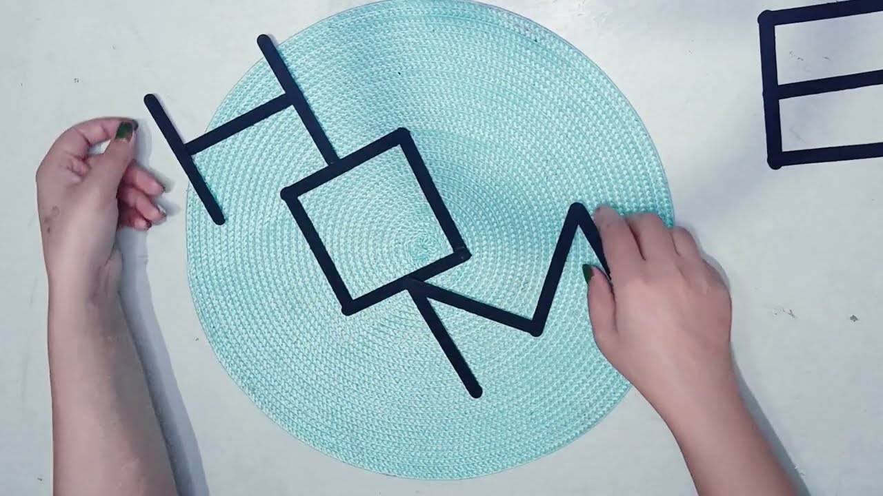  DIY‑Style HOME Wall Art Made with Wooden Sticks