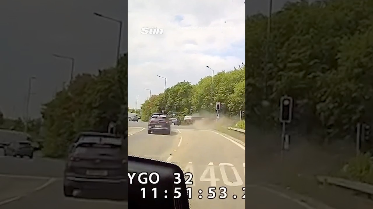 Heart-stopping moment speeding driver ploughs into car after running red light