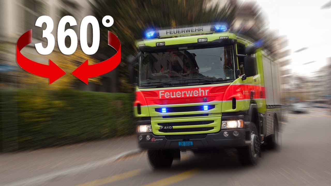 Fahre im Feuerwehrauto mit Blaulicht durch Zürich I 360-Grad-Video