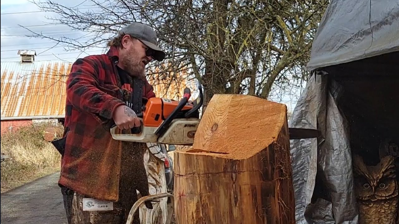 Chainsaw Carving a Wizard with a hat, 